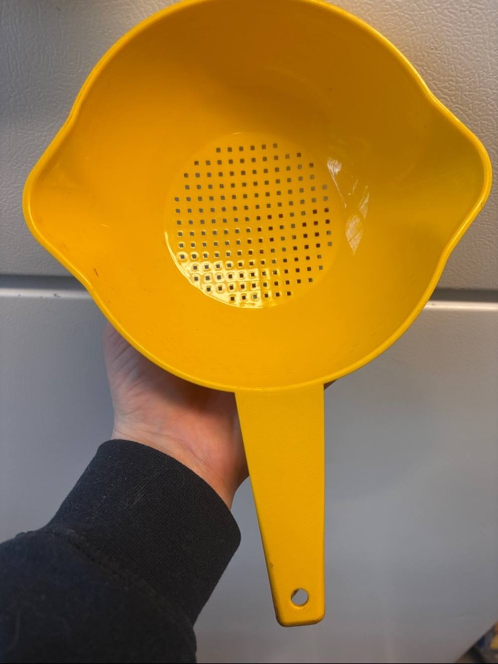 Vintage yellow Tupperware strainer